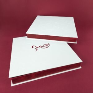 white and red leather box with 10 dividers with filled dates